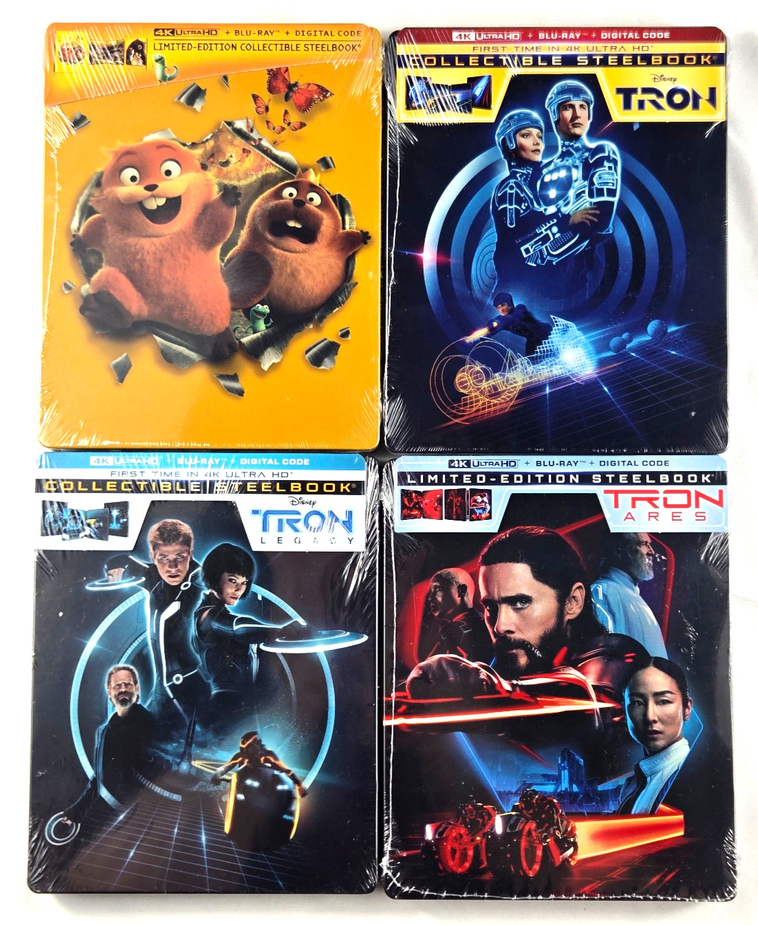 Hoppers 4K & Tron Ares 4K & Tron Legacy 4K & Tron 4K (4x DISNEY STEELBOOK)