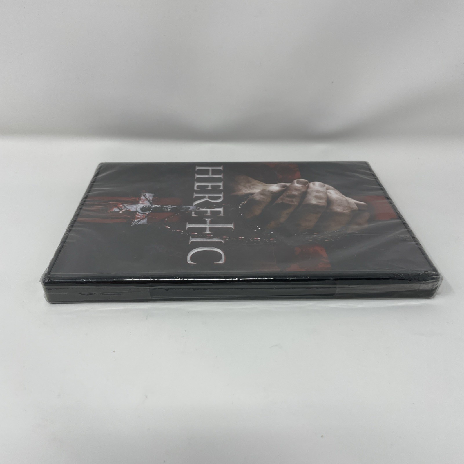 Heretic (2023) DVD New Sealed UK Horror Film 94 Min