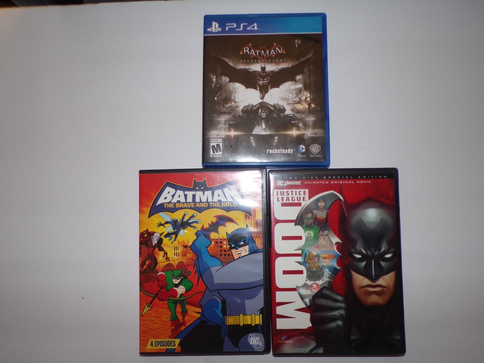 3 Batman 2 movies 1 (2) disc and 1 PS4 Arkham Knight