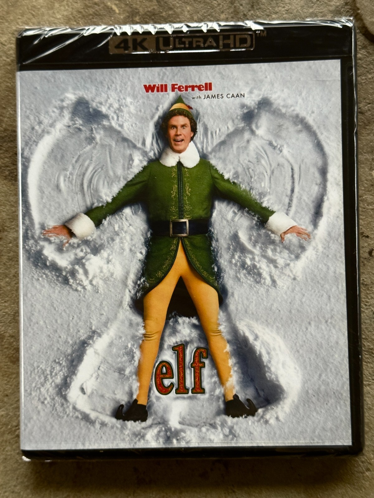 Elf (Warner 4K); Jon Favreau (dir.); Will Ferrell, James Caan, Bob Newhart; New