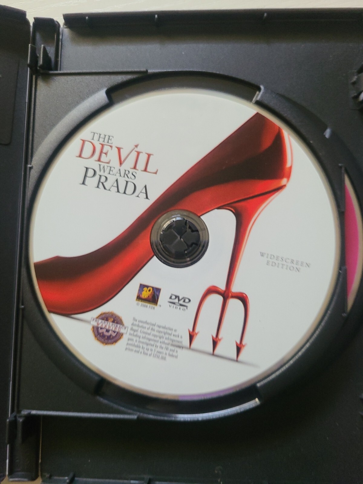 1. The Devil Wears Prada 2. 27 Dresses (DVD, 2006)READ THE DESCRIPTION